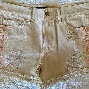 Light Pink Hollister shorts with stitch design